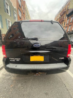 2005 Ford Explorer XLT 4WD parked in Brooklyn, showcasing its rear view and clean title.