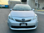 Front view of a silver 2012 Toyota Prius V Three with clean title and low mileage for sale.