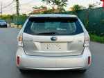 Rear view of a 2012 Toyota Prius V Three in silver, showcasing clean design and no visible damage.