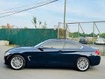 2014 BMW 4 Series 428i RWD Coupe in blue with alloy wheels and clean body