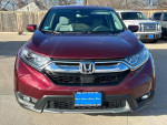 Front view of a 2019 Honda CR-V EX in Basque Red Pearl II, showcasing its sleek design and modern features.