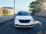 Front view of a 2013 Ram C/V Tradesman Cargo Van with roof racks, 119,000 miles, in good condition