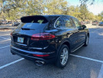 2015 Porsche Cayenne S AWD in excellent condition parked with panoramic roof and twin-turbo engine.