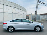 2011 Hyundai Sonata GLS in silver color parked on the street with clean exterior and alloy wheels.