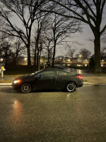 2012 Honda Civic LX Coupe parked at night, showcasing clean lines and sleek design.