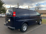 2016 Chevrolet Express 2500 Cargo Van in excellent condition with roof racks and low mileage.