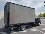 2018 Chevrolet Express cutaway truck for mobile LED digital advertising in a parking lot