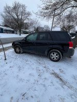 2004 Saturn Vue AWD with Honda engine, parked on snowy driveway, available for local pickup only.