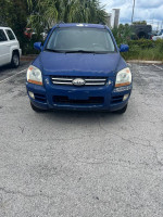 2006 Kia Sportage for sale with 55,000 miles, dependable daily driver, original faded paint, good tires.