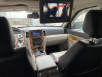 Interior of a 2008 Jeep Grand Cherokee Limited showing dashboard and entertainment screen