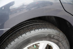 Close-up of the tire on a well-maintained 2013 Subaru Outback with new treads.