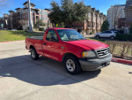 2003 Ford F-150 truck with 135,000 miles, well maintained, suitable for daily driving or work.