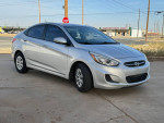 2015 Hyundai Accent GLS for sale, silver sedan with clean interior and low mileage in Lubbock