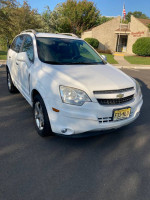 2012 Chevrolet Captiva Sport in white with 125,000 miles, well-maintained and equipped with automatic transmission.