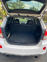 Interior view of 2012 Chevrolet Captiva Sport trunk space, well-maintained and clean.