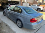 2007 BMW 328I for sale with 116604 miles, showing its rear side in good condition