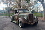 1936 Ford pickup truck 'La Cucaracha' with unique patina and vintage style parked outdoors