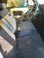 Interior view of a 1968 El Camino, showcasing seats and steering wheel, ideal project car needing body work.