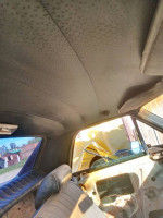 Interior view of a 1968 El Camino, showing the headliner and dashboard, perfect for restoration projects.