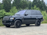 2012 Land Rover Range Rover Supercharged in black, showcasing stylish design and powerful V8 engine.