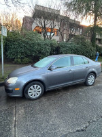 2006 Volkswagen Jetta parked in excellent condition with updated maintenance and features.