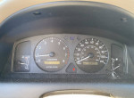 Dashboard and gauge displays of a 2001 Toyota Corolla CE with 110,000 miles on it