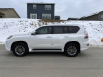 2015 Lexus GX 460 4WD luxury SUV with black leather interior, parked in a snowy location.