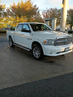 2014 Ram 1500 Limited in white, 4x4, crew cab, with low mileage and premium features