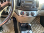 2010 Hyundai Elantra interior showing controls and automated features in a well-maintained vehicle