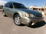 2004 Subaru Outback AWD wagon in green, 133,000 miles, features power options and alloy wheels.