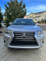Front view of a silver Lexus GX 460 Luxury Edition with black interior, well-maintained and zero accidents.