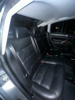 Interior view of a 2002 Volkswagen Passat GLX 4Motion showing spacious black leather back seats.
