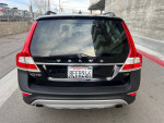 Rear view of a 2015 Volvo XC70 in black, showing clean design and license plate