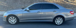2012 Mercedes-Benz E350 Sport Sedan in Palladium silver metallic with black interior, showing clean exterior and alloy wheels.