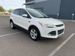 2013 Ford Escape SE FWD in white, showing exterior and new tires, great gas saver for sale.