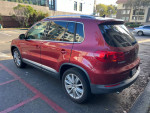 2014 Volkswagen Tiguan SEL 4Motion AWD in excellent condition parked in a lot with clean title and low mileage.