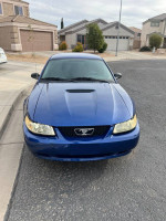 2004 Ford Mustang for sale, blue color, 91,000 miles, salvage title, front view