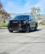 2022 GMC Sierra X31 SLT in black, showcasing its modern design and 4X4 capability.