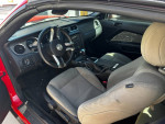 Interior view of a 2012 Ford Mustang with automatic transmission and clean dashboard.
