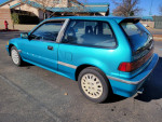1991 Honda Civic Si hatchback in blue, showcasing its original design and condition, parked outdoors