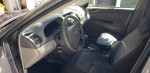 Interior view of a 2005 Toyota Camry showcasing steering wheel and upholstery.