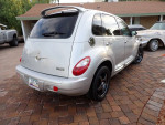 2006 Chrysler PT Cruiser GT with turbo engine, leather interior, and aluminum wheels parked outdoors.