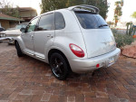 2006 Chrysler PT Cruiser GT in silver with 17-inch wheels parked outdoors