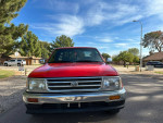 Front view of 1993 Toyota T100 SR5 4WD in good condition with long bed, low mileage, and clean title.