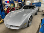 1980 Chevrolet Corvette C3 in mint condition with gray paint and original features, located in a garage.