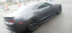 2010 Chevrolet Camaro LS with custom racing suspension and HID lights for sale, showing rear view and sleek black design.