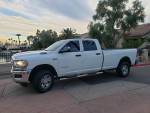 2021 Ram 2500 Tradesman 4WD crew cab truck parked in Scottsdale, Arizona against a scenic backdrop.