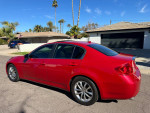 2009 Infiniti G37 sedan in red, great condition, offering premium options and clean title for sale.