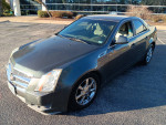 2009 Cadillac CTS in fair condition, features rear brakes and smooth transmission, shown in parking lot.