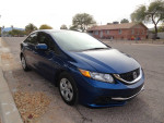 2015 Honda Civic in excellent condition with 143,000 miles, features backup camera and Bluetooth, shown parked outdoors.